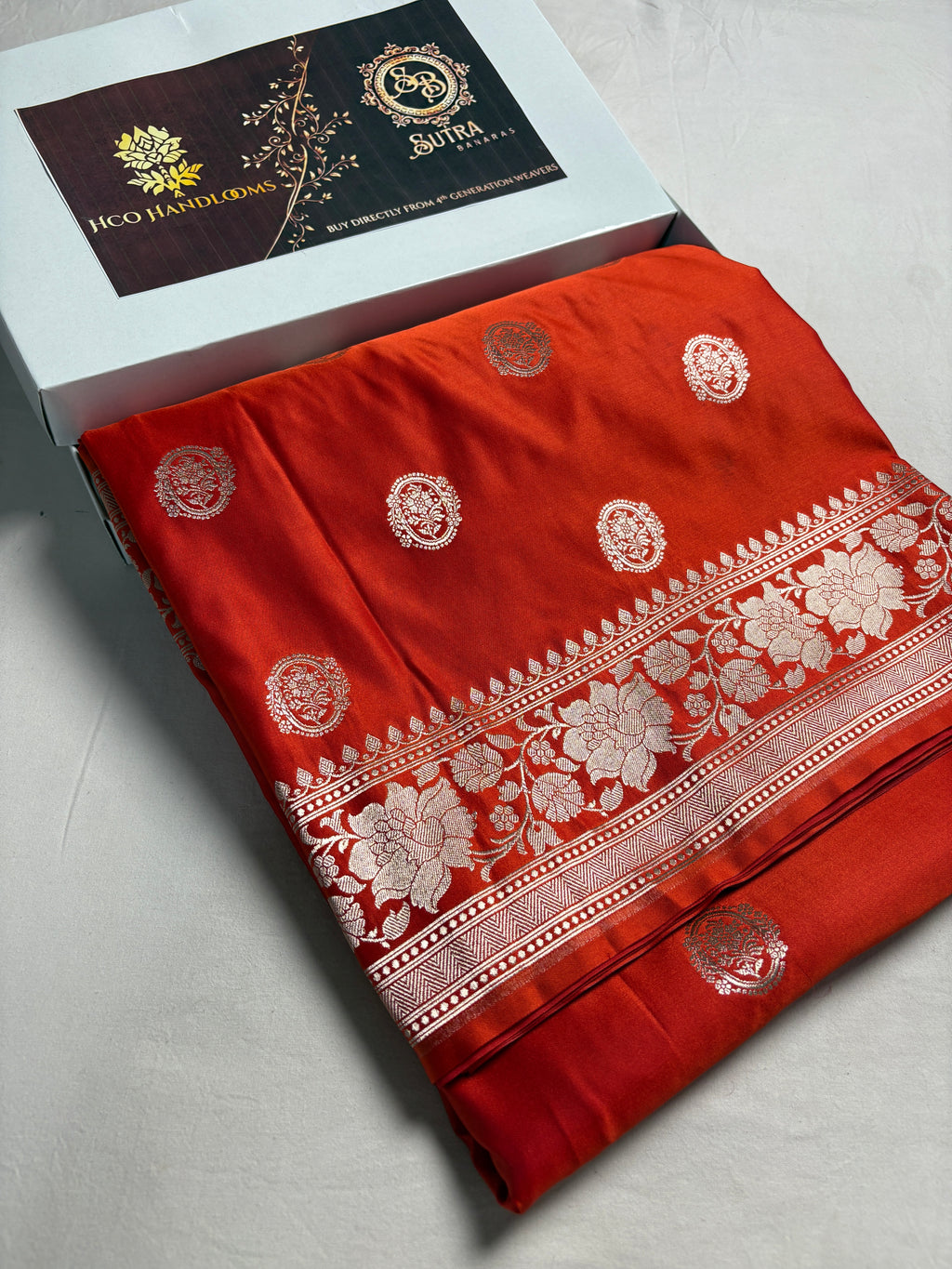 Orangey Red Premium Mashru Katan Silk Boota Banarasi Saree
