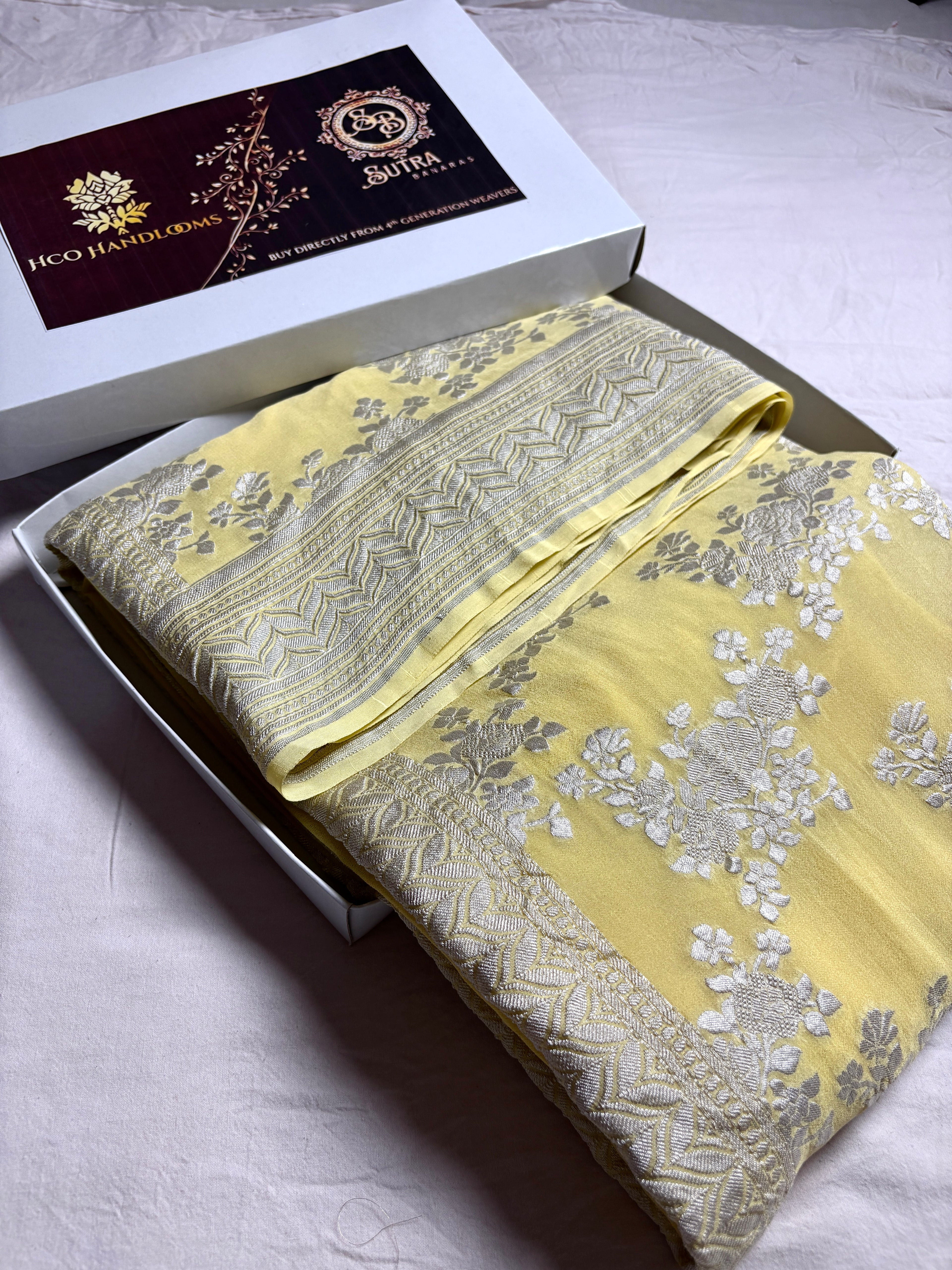 Yellow Pure Khaddi Georgette Silk Handloom Banarasi Saree - Silver Zari